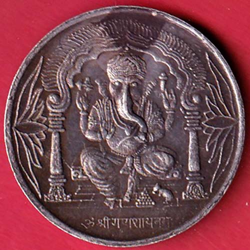 silver token: Weight – 9.91 gm shree Ganesh and 